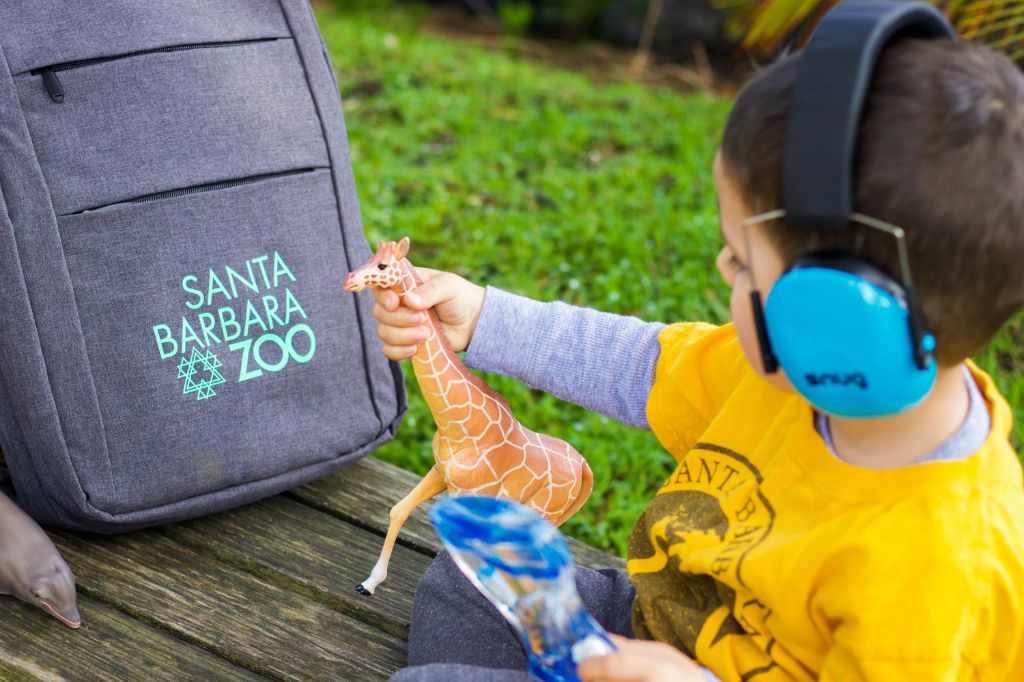 boy playing with sensory backpack